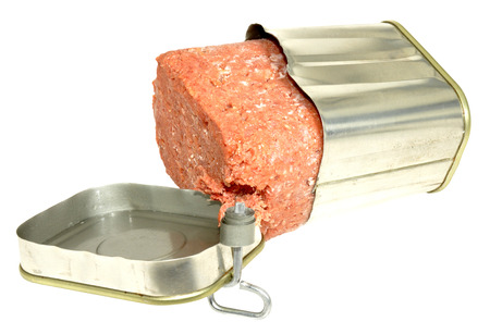 Opened tin of corned beef meat, isolated on a white background の写真素材