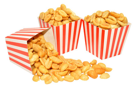 Roasted salted peanuts in red and white striped boxes isolated on a white background