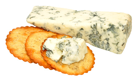 Soft blue veined Dolcelatte cheese with cheese biscuits isolated on a white backgroundの写真素材