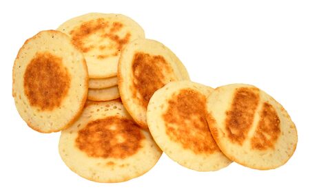 Group of small blini pancakes isolated on a white backgroundの写真素材