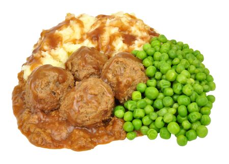 Pork meatball faggots and mashed potato meal isolated on a white backgroundの写真素材