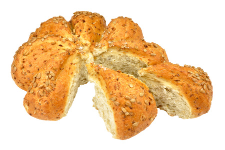 Sunflower seed covered bread loaf isolated on a white background