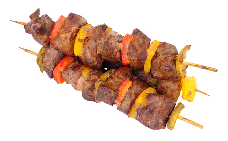 Grilled lamb meat and sweet pepper kebabs isolated on a white backgroundの写真素材
