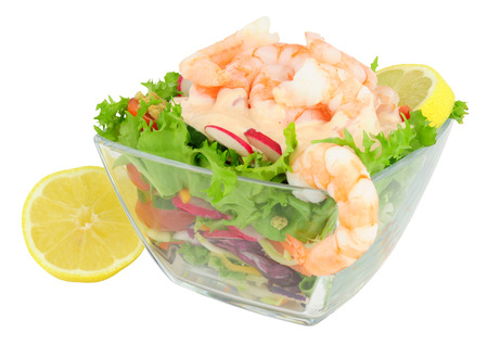 Simple fresh prawn salad in a glass dish isolated on a white backgroundの写真素材