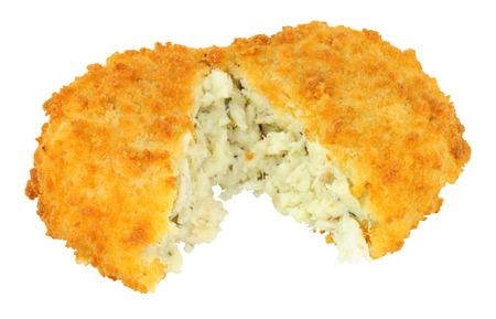 Breadcrumb covered cod fish cake isolated on a white background