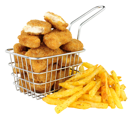 Breadcrumb covered chicken nuggets and French fries in a small wire frying basket isolated on a white backgroundの写真素材