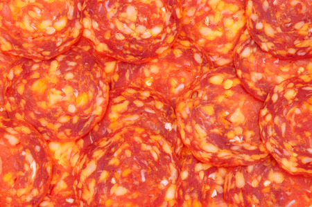 Spicy chorizo sausage meat slices backgroundの写真素材