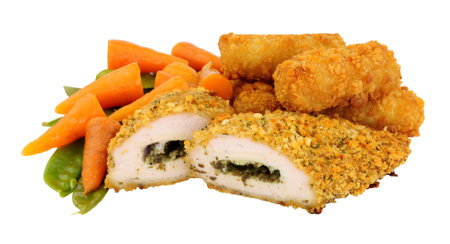 Garlic butter filled whole breaded chicken breast meal with potato croquets and vegetables isolated on a white backgroundの写真素材