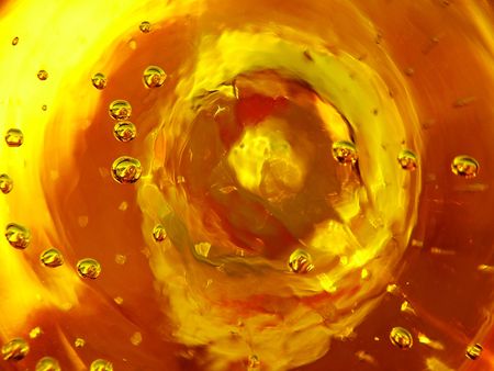 This image was captured by holding the lens against the thick globular base of a yellow glass vase...
