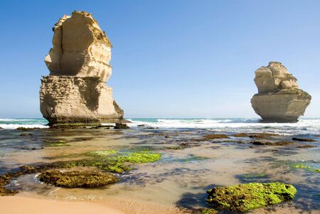 Two of the Twelve Apostles - a series of limestone stacks on the shoreline in Southern Victoria, is one of Australia's premier tourist attractionsの写真素材
