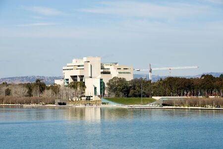 The Australian High Court building, beside Lake Burley Griffin, Canberra, Australiaの写真素材