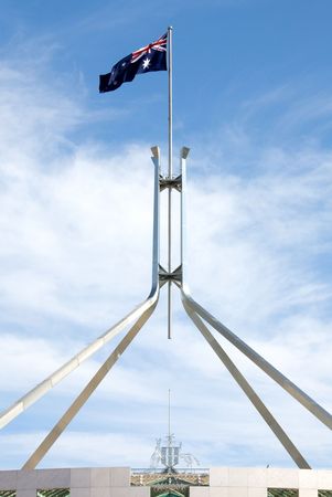 The Australian flag, atop Parliament House, Canberra, Australiaの写真素材