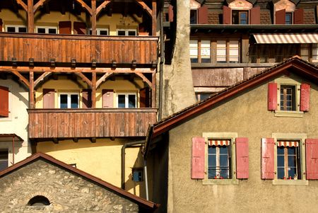 Houses on a steep hilside, adjacent to the shoreline of Lake Geneva, Switzerlandの写真素材