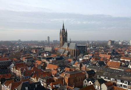 A view of the houses and buildings in Delft, the Netherlands, captured from the church spire of the New Church (Nieuwe Kerk)の写真素材