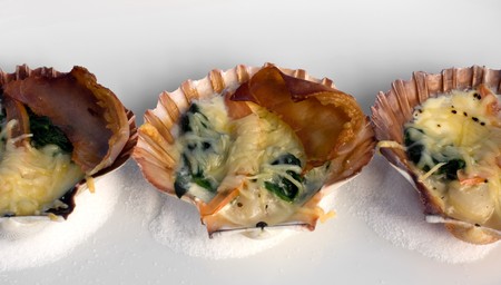 Tasmanian Scallops in the shell, grilled with Pancetta, Spinach, and a two-cheese sauce