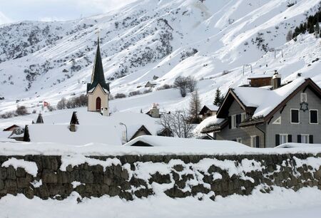 An alpine village after a heavy snowfall, Switzerlandの写真素材