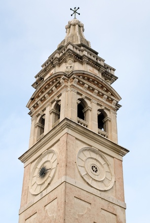The bell tower of a church, Venice, Italyの写真素材
