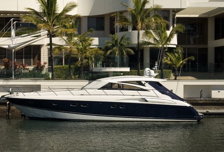 A boat moored beside a luxury home, Surfers Paradise, Queensland, Australiaのeditorial素材