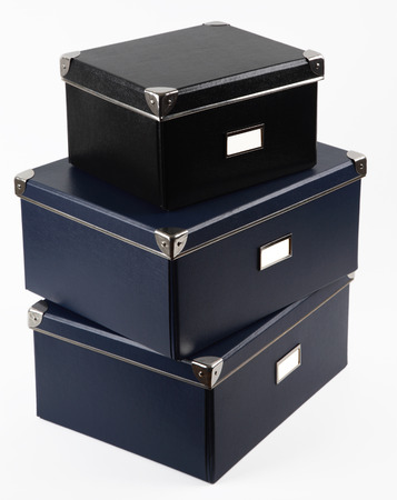 3 file boxes stacked on top of each other, shot on a white background.の写真素材
