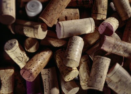 A random bunch of wine corks, with tilt shift focus.の写真素材