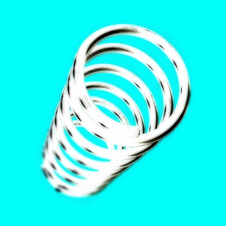 An abstarct view of a shock absorbing motor spring with shalllow depth of field.
