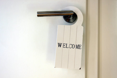Toilet / restroom door with welcome signの写真素材