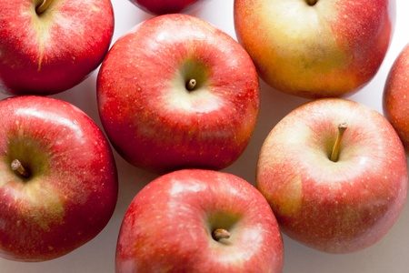 Red apples on a white background