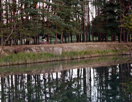 cycling on lakeの写真素材