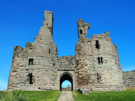 Dunstanborgh castle in northumbria main gatewayの写真素材