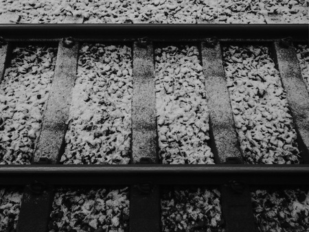railway tracks covered in thick frost in winterの写真素材