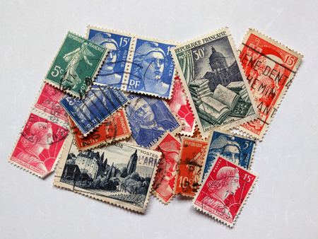 colorful arrangement of old french postage stampsのeditorial素材