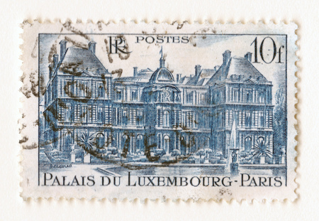 Leeds, England - April 26 2018: An old blue vintage french postage stamp with an image the palace of Luxembourg in Parisのeditorial素材