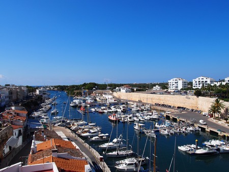 Ciutadella, Menorca, Spain - 2 October 2018: panoramic view of the harbour and cityscape of Ciutadella in Menorcaのeditorial素材