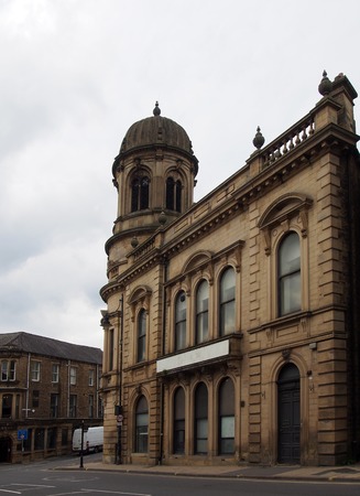 sowerby bridge, west yorkshire, united kingdom - 18 june 2019: the former town hall building along wharf street the main road running though the centre of sowerby bridge in west yorkshireのeditorial素材