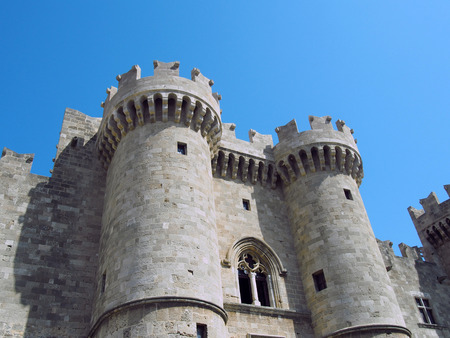 the front and entrance to the medieval palace of the grandmasters in rhodes town against a blue summer skyのeditorial素材