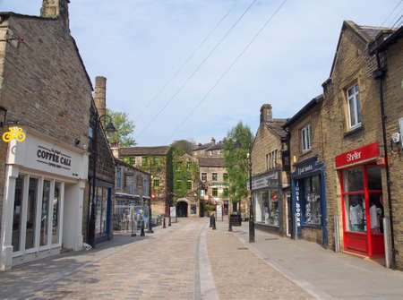 hebden bridge, west yorkshire / united kingdom - 20 May 2020: bridge gate in the centre of hebden bridge with shops and cafes on either side of the roadのeditorial素材