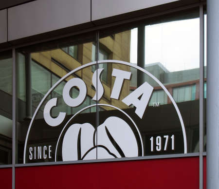 leeds, west yorkshire, united kingdom - 11 may 2021: sign above the entrance of the costa coffee...