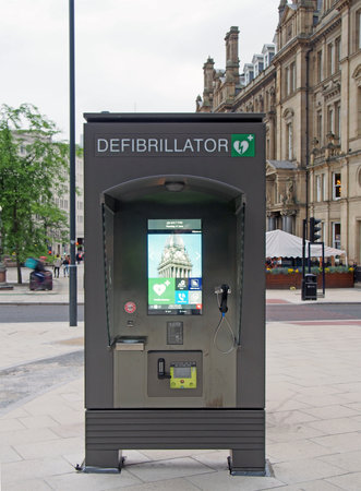 leeds, west yorkshire - 17 June 2021: public emergency defibrillator and information point in city...