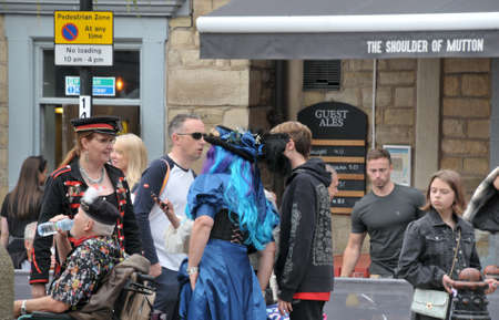 hebden Bridge, West Yorkshire, United Kingdom - 01 august 2021: a group of people in costume stood in the town square at the annual hebden bridge steampunk weekendのeditorial素材