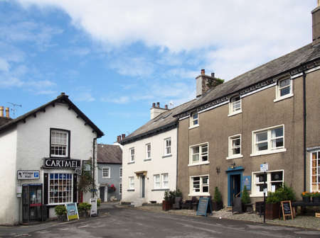cartmel, cumbria, united kingdom - 16 september 2021: the village square and shop in cartmel cumbria