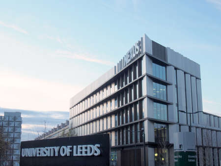 leeds, west yorkshire, united kingdom - 17 december 2021: the nexus business building and sign at the entrance to the campus at the university of leedsのeditorial素材