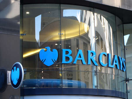 leeds, west yorkshire, united kingdom- 27 march 2022: sign and logo on the window of a branch or Barclays bank on albion street in leeds city centreのeditorial素材