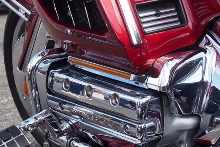 Scarborough, North Yorkshire, United Kingdom - 10 September 2022: close up of the engine of a modern red honda gold wing 1800 cc luxury touring motorbikeのeditorial素材