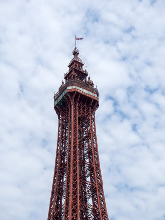 Blackpool Tower in summer sunlight against a bright blue cloudy skyの写真素材