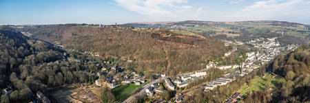 wide scenic aerial panoramic view of hebden bridge showing surrounding villages and the calder...