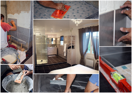 Tiler at work in bathroomの写真素材