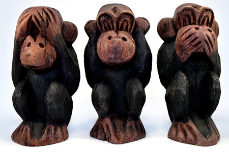 Three wooden monkeys.の写真素材