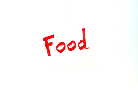 Mot Food written in red letters on white backgroundの写真素材