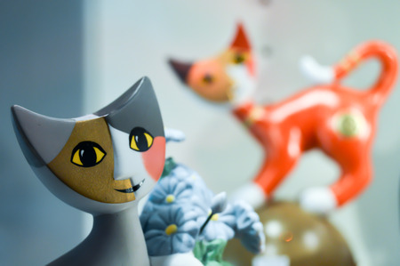 Cat in pottery with the face painted in two in the black forest in allamagneの写真素材