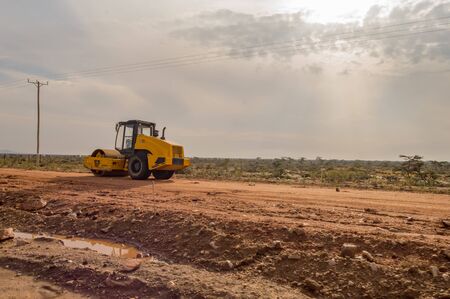 Rift,Kenya,Afrique-03/01/2018.Construction machinery on the construction of a new road at the track site in Kenya's rift valleyのeditorial素材